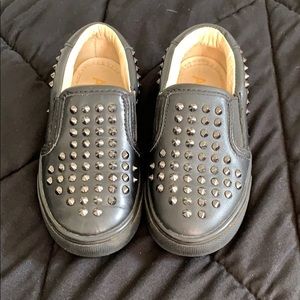 AKID black leather studded sneakers